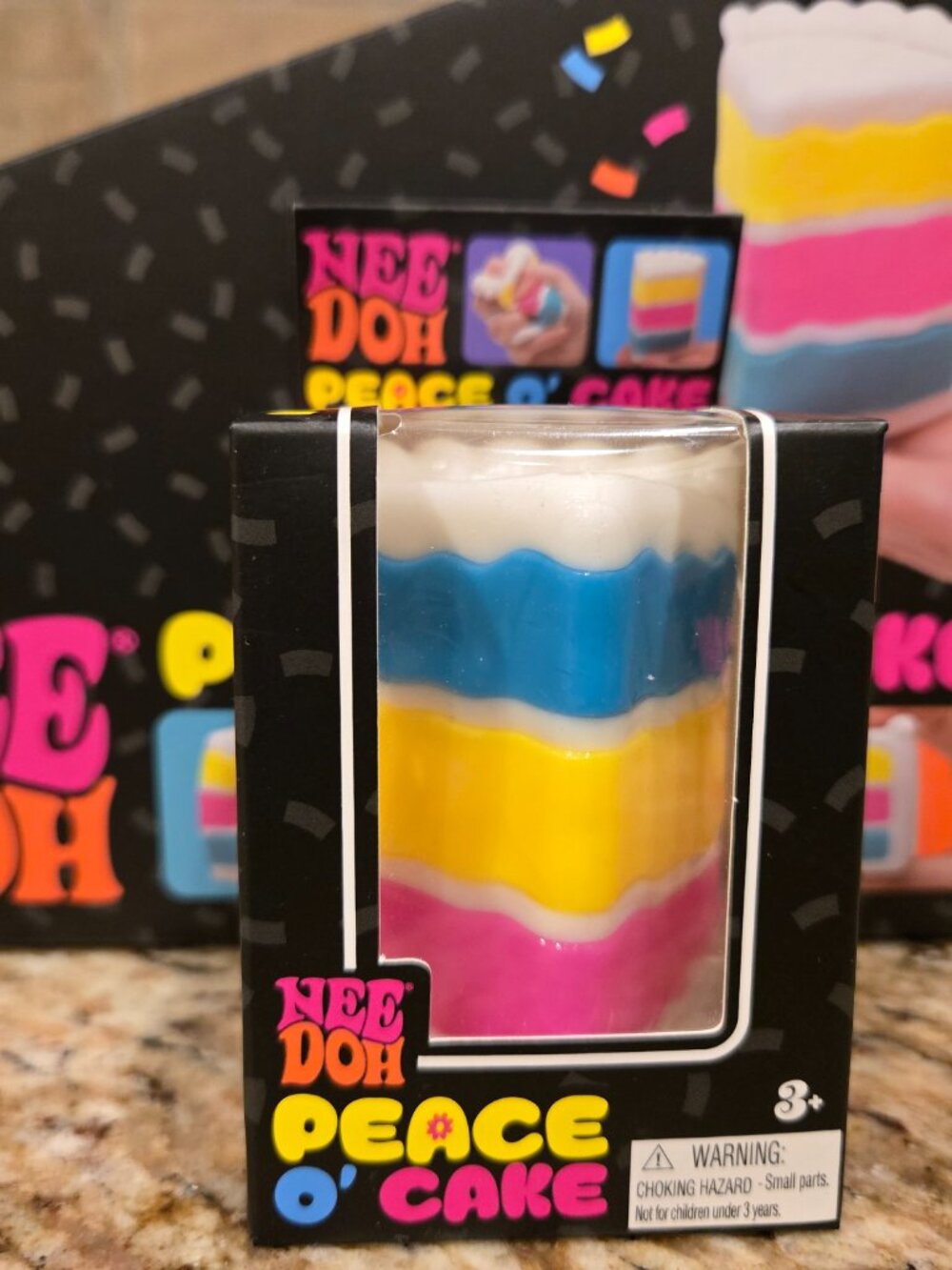 NeeDoh Kids Layered Squishy Toy — Pink, Yellow & Blue